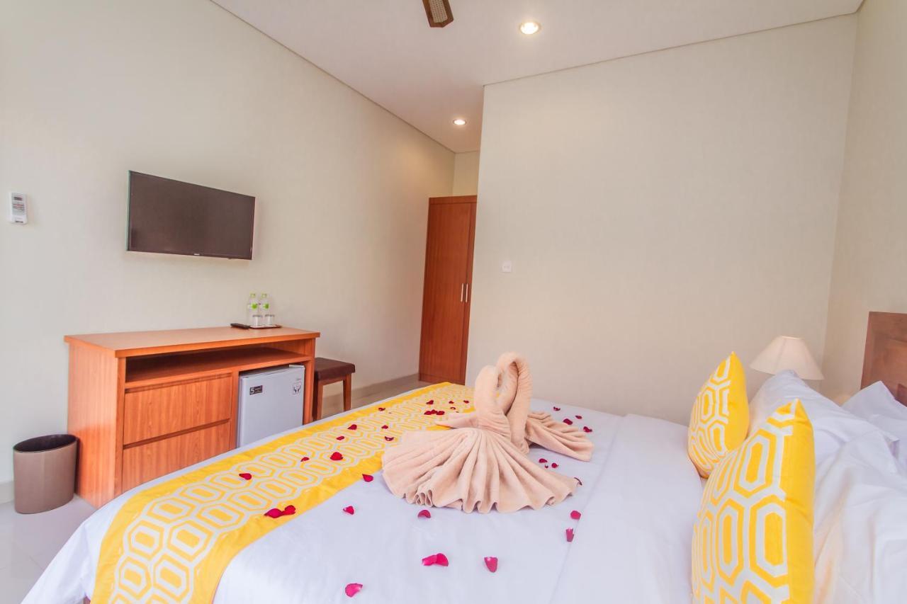 Готель Cening Ayu Sanur Екстер'єр фото